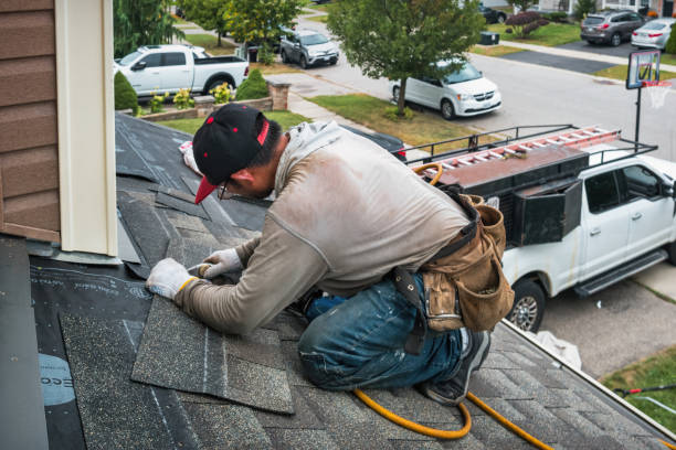 Professional Storm Damage Roof Repair technician working in Plymouth, OH